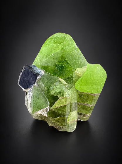 Green Peridot Crystal with Magnetite from Pakistan - 60 Grams