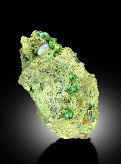 large demantoid garnet crystal specimen
green demantoid garnet with calcite