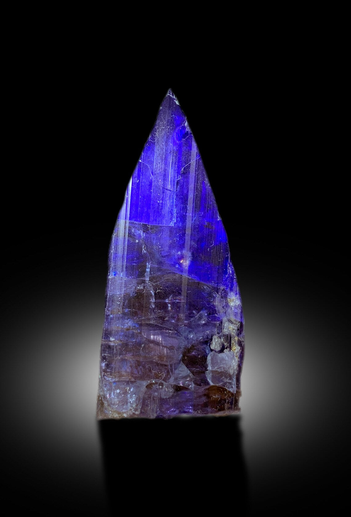 mineral display specimen with blue tanzanite
rare tanzanite crystal for sale
natural blue gemstone crystal specimen