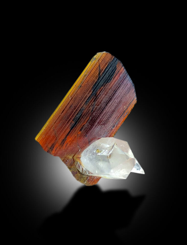 red brookite stone raw mineral display
natural brookite crystal damage free specimen

