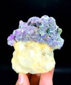 raw purple corundum mineral close view
natural corundum crystal cluster pakistan