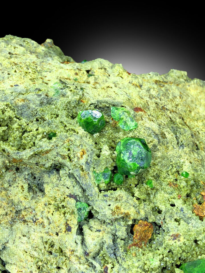 large green garnet crystal self standing
natural demantoid garnet with calcite crystals