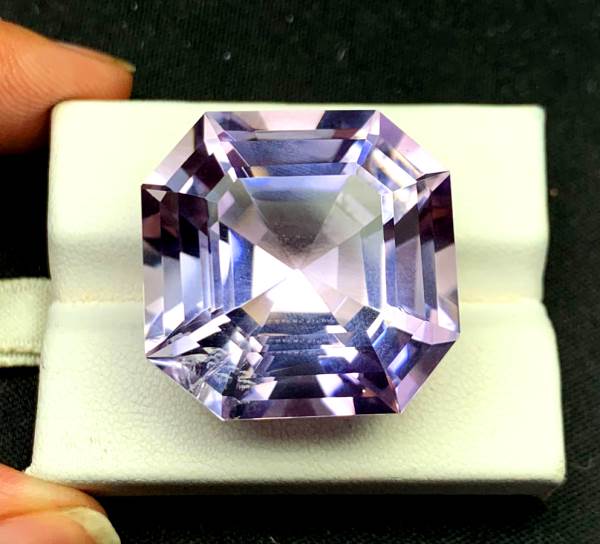 natural purple amethyst gemstone 56.50 carats
large amethyst gemstone fancy cut deep purple
