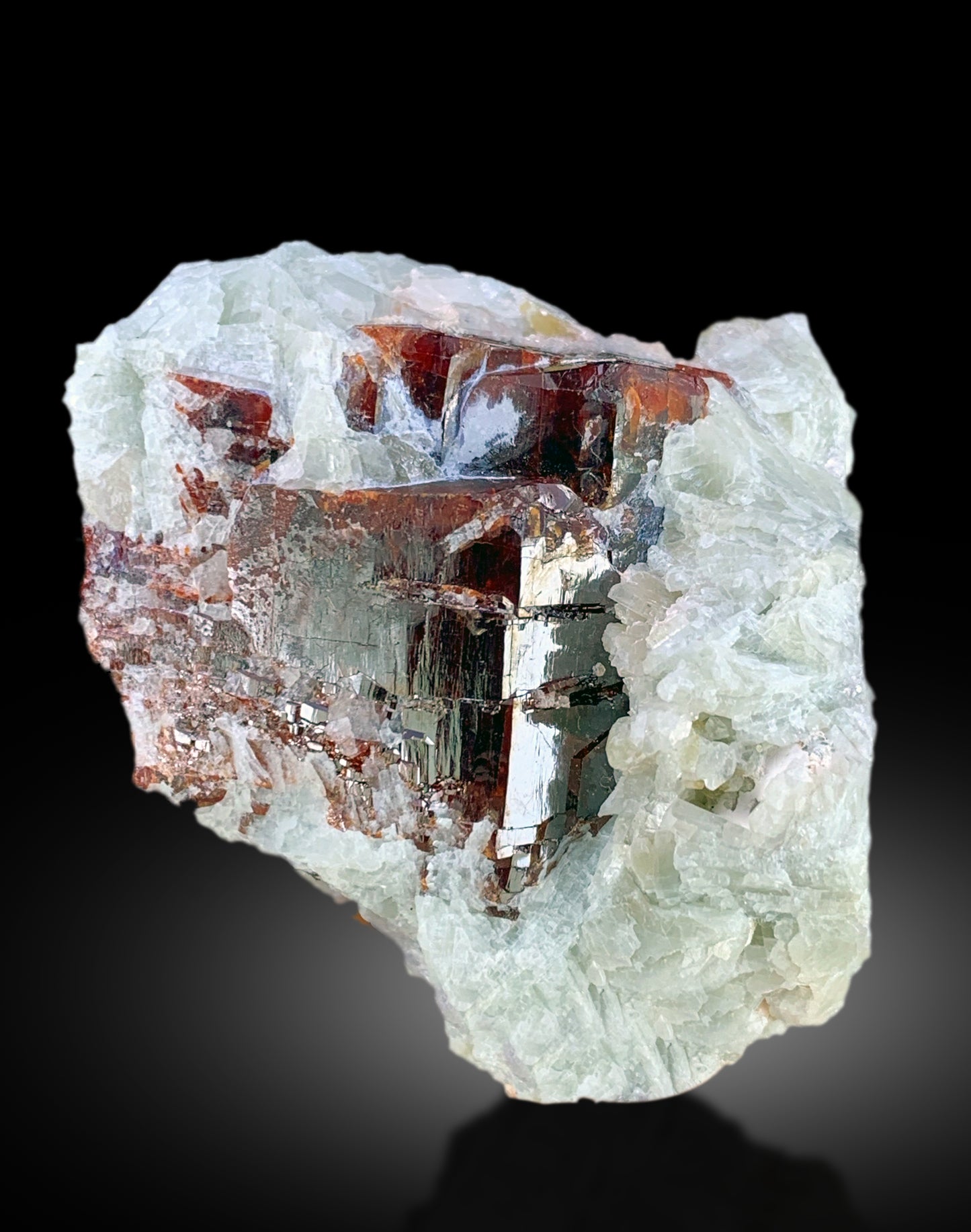 Afghanistan tantalite crystal cluster
rare red tantalite crystal formation
natural tantalite with feldspar association
step terminated tantalite crystal specimen
cabinet display tantalite mineral