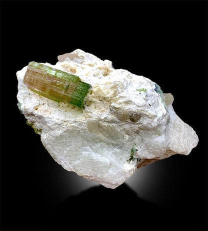 natural bicolour tourmaline specimen close view
paprok afghanistan tourmaline mineral rock
