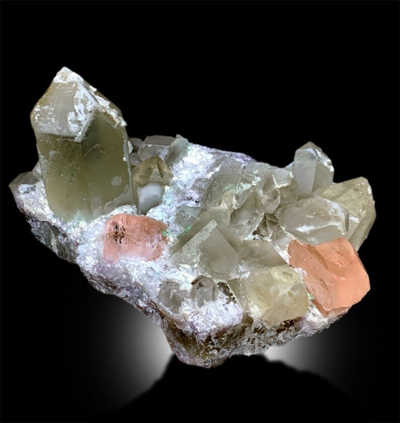 cleavelandite albite with morganite
pink morganite crystal on matrix