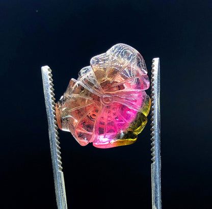 natural multicolor tourmaline stone
jewelry grade tourmaline carving
polished gemstone carving close up