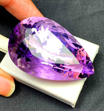 premium purple amethyst investment stone
natural amethyst cut stone close view