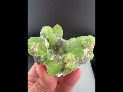 Green Peridot Crystals With Magnetite From Pakistan - 85 Grams