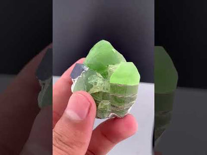 Lush Green Peridot Crystal With Magnetite From Pakistan - 60 Grams