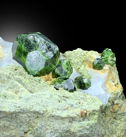 untreated demantoid garnet mineral specimen
self standing garnet crystal display piece