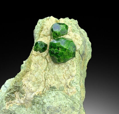 cabinet size green garnet crystal cluster
vibrant demantoid garnet formation on matrix